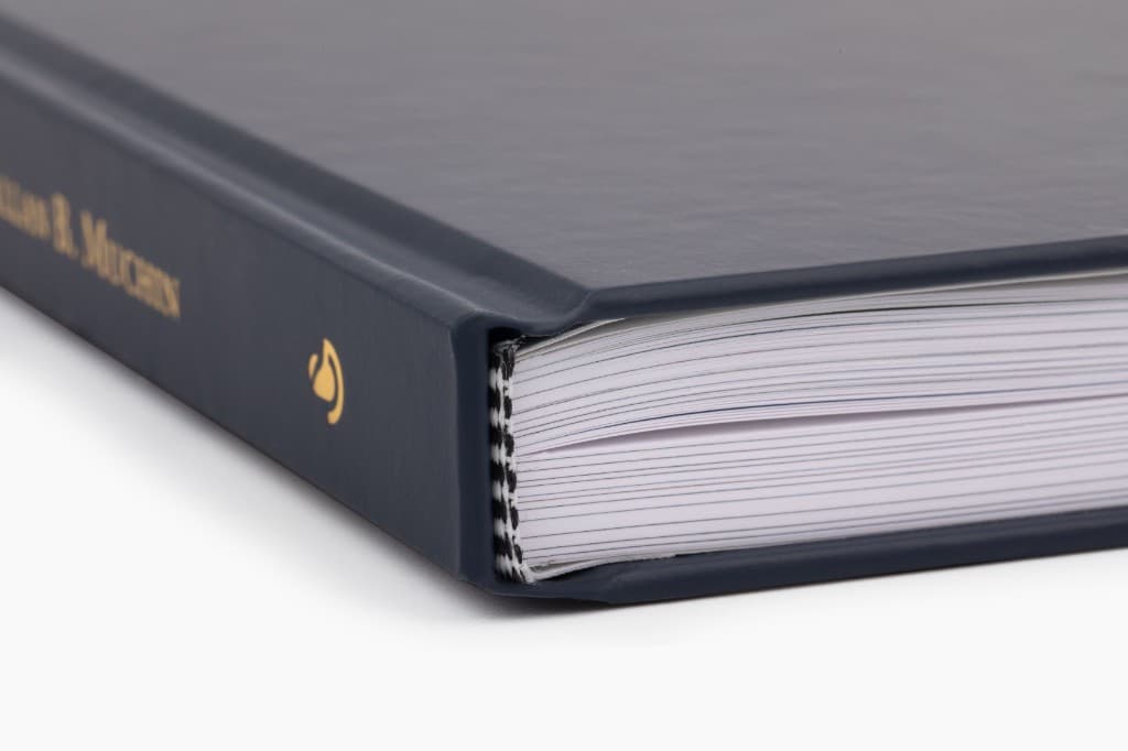 Gold-stamped spine and signature-sewn headband