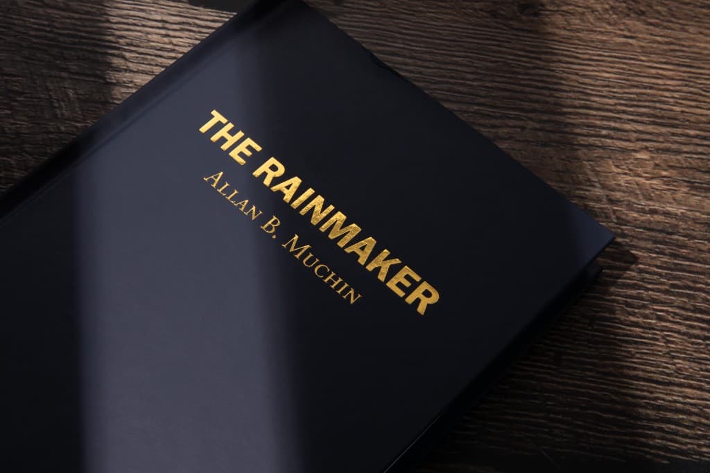 Foil-stamped cover resting on wood